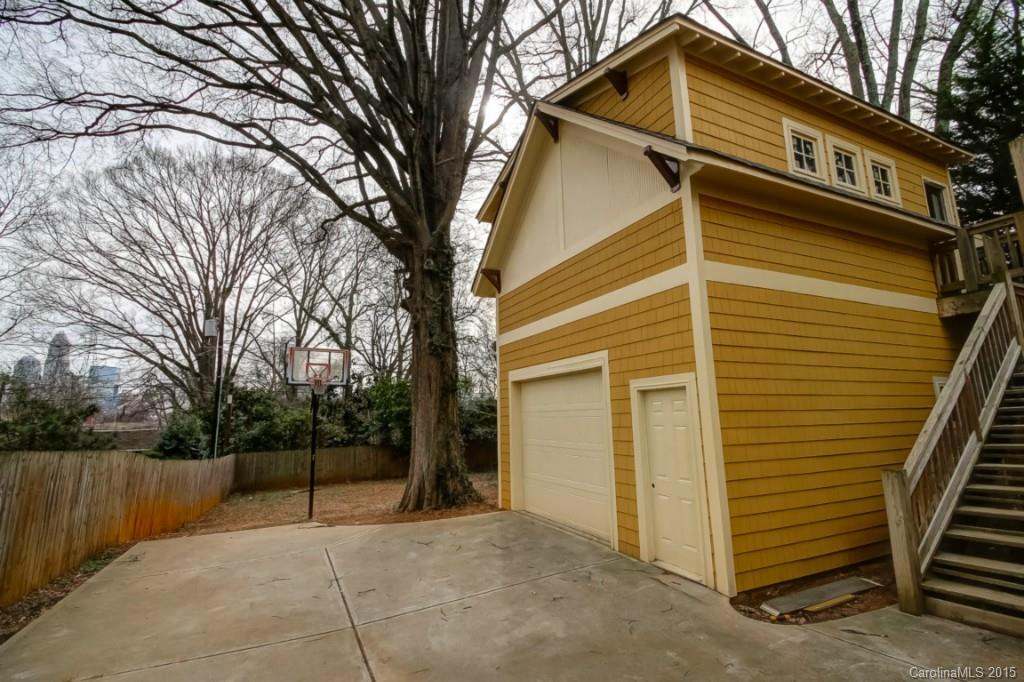 521 Grandin Road Charlotte, NC 28208 - Photo 20 of 23 a view of a house with a yard