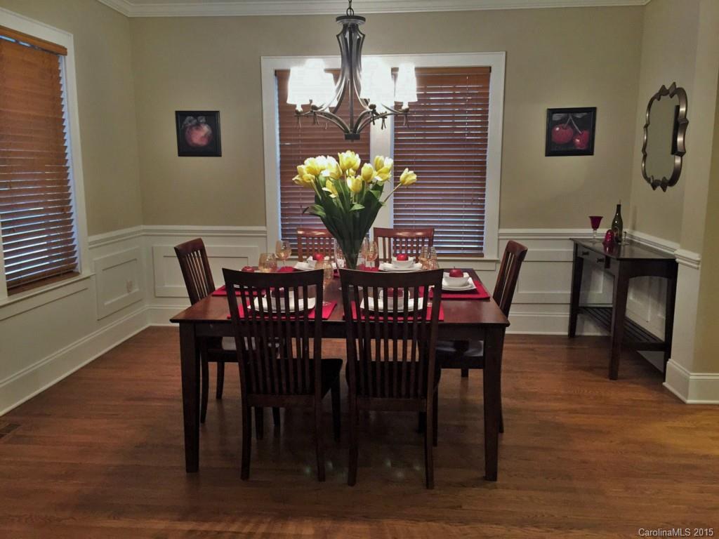 521 Grandin Road Charlotte, NC 28208 - Photo 3 of 23 a view of a dining room with furniture and wooden floor