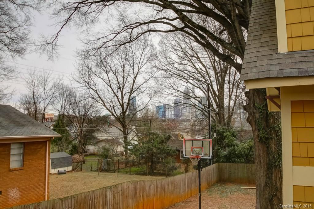 521 Grandin Road Charlotte, NC 28208 - Photo 22 of 23 a view of a house with a yard