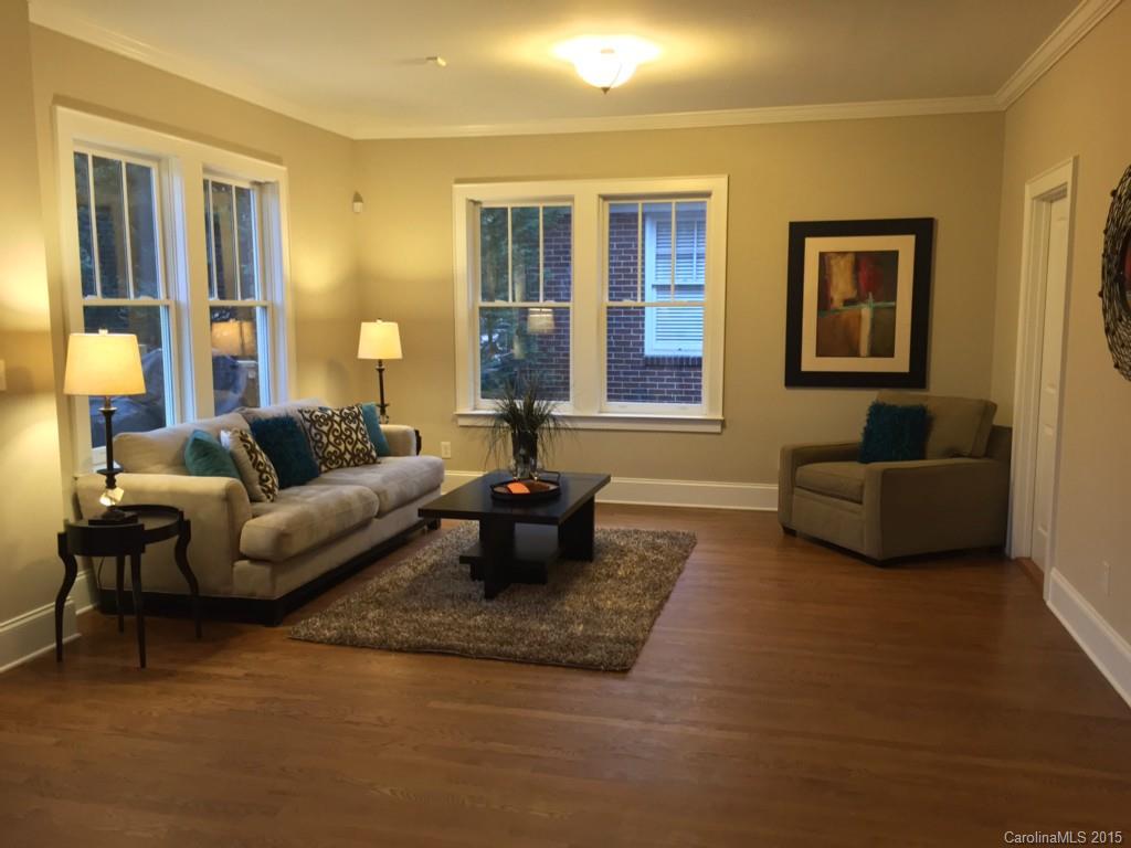 521 Grandin Road Charlotte, NC 28208 - Photo 8 of 23 a living room with furniture and a large window