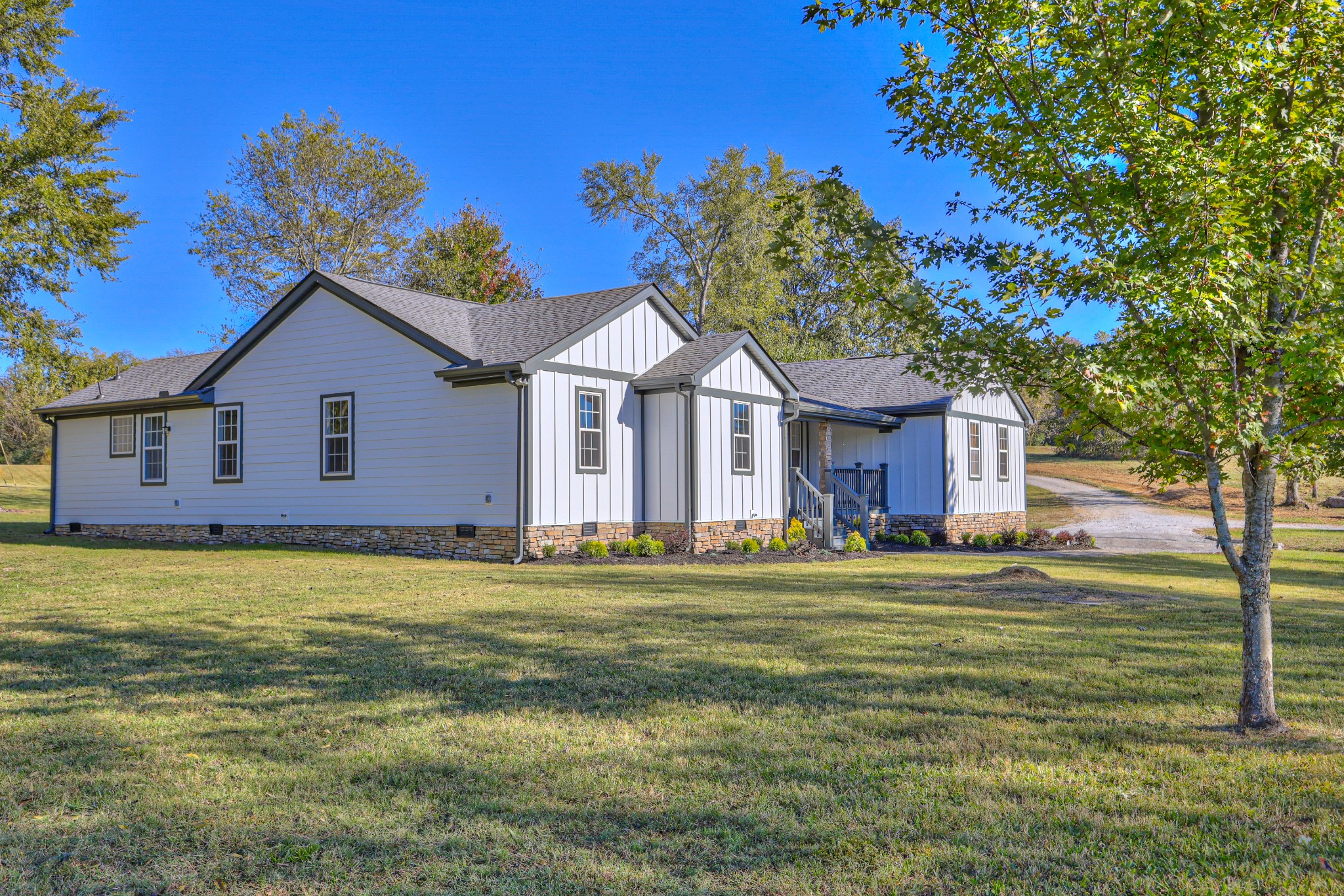 1380 Haley Road Watertown, TN 37184 - Photo 1 of 95 a front view of a house with a garden
