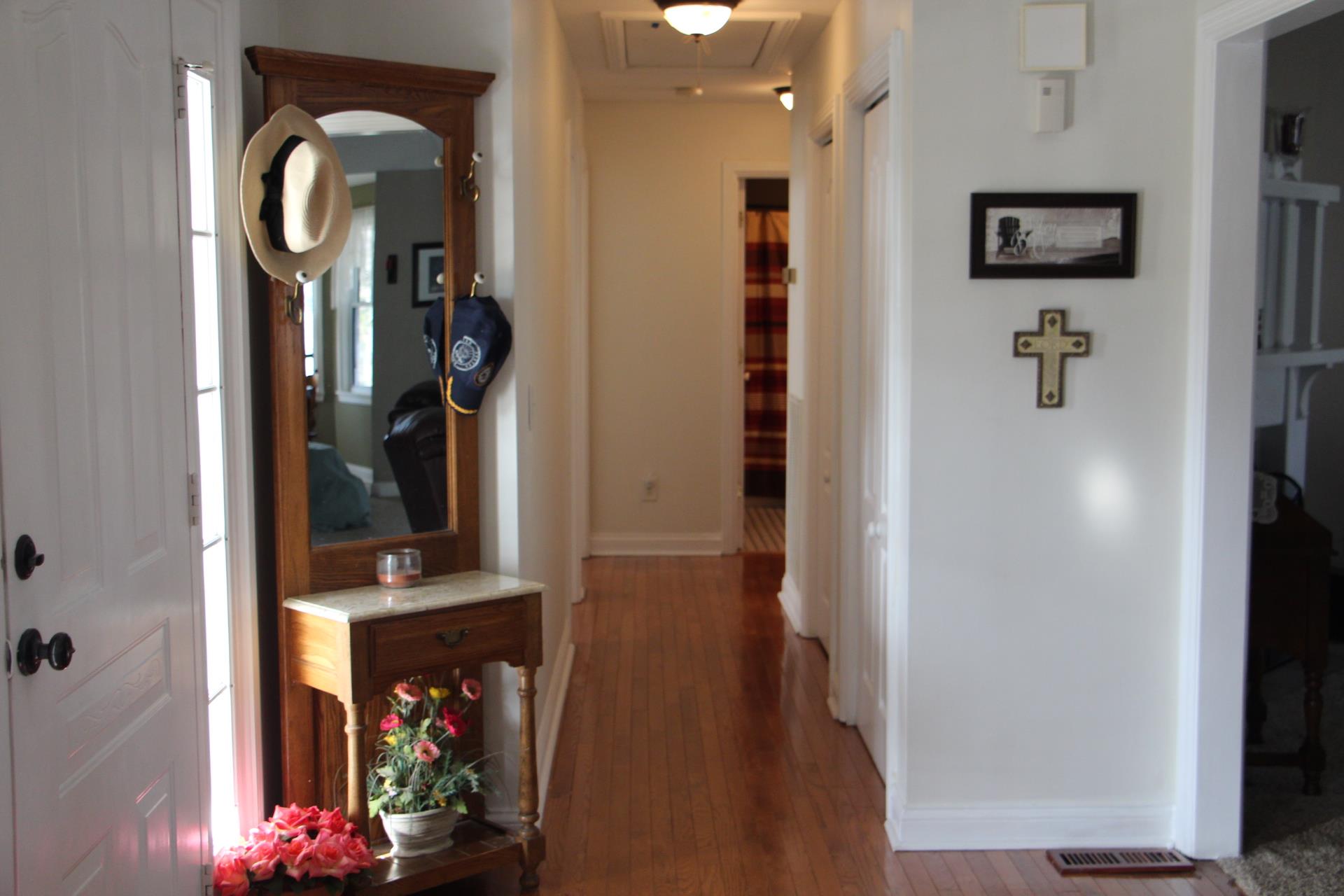 4373 Oregon Road Springfield, TN 37172 - Photo 15 of 18 a view of a hallway with wooden floor and entryway