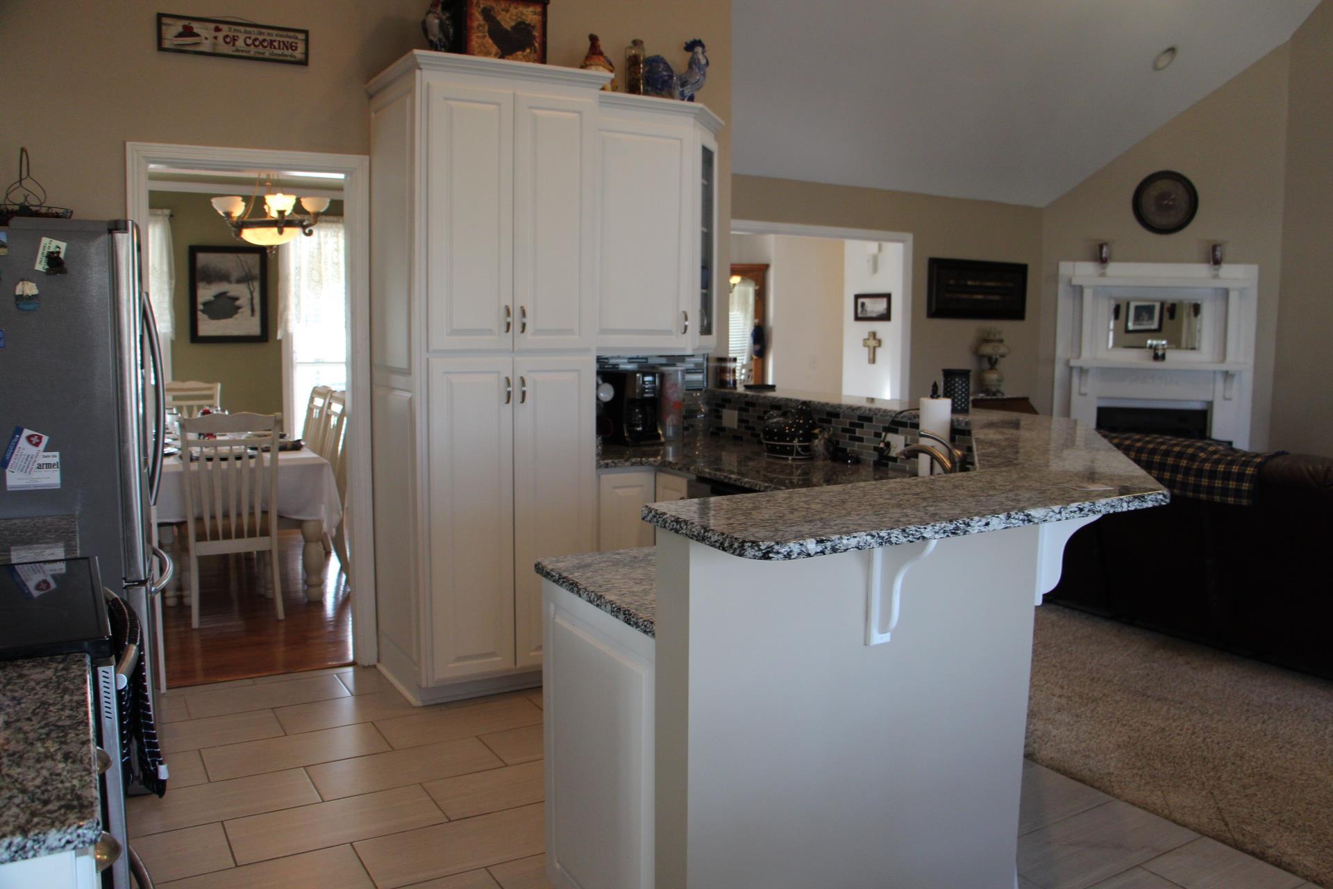 4373 Oregon Road Springfield, TN 37172 - Photo 5 of 18 a kitchen with stainless steel appliances granite countertop a refrigerator and a sink