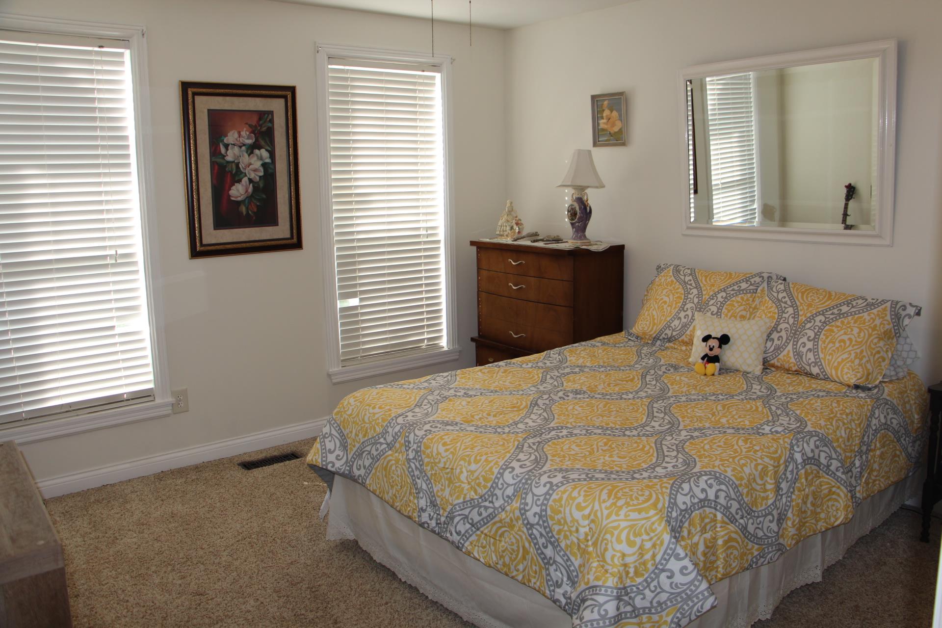 4373 Oregon Road Springfield, TN 37172 - Photo 9 of 18 a bedroom with a bed and a window