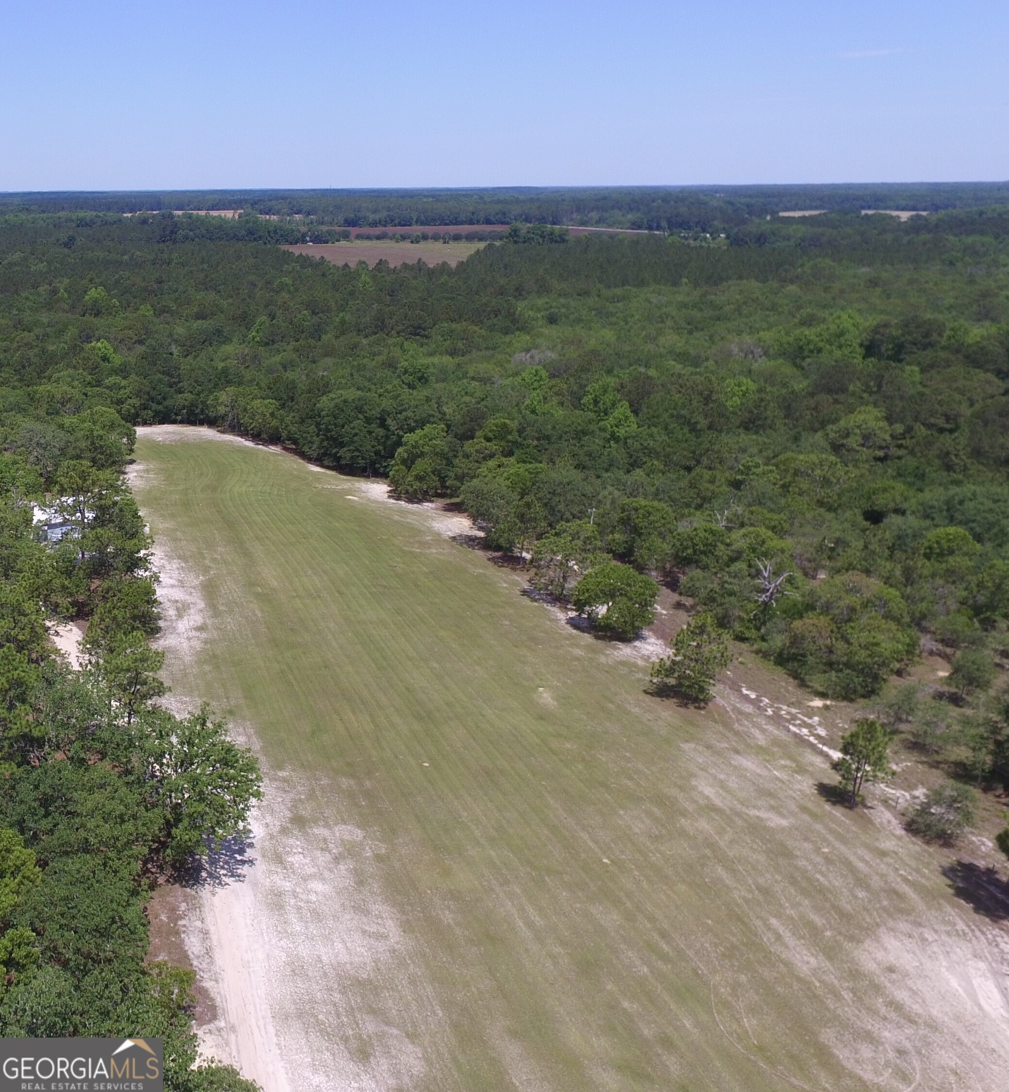 0 Ben Grady Collins Road, Unit LOT 3 Statesboro, GA 30450 - Photo 1 of 3 a view of a field with an ocean