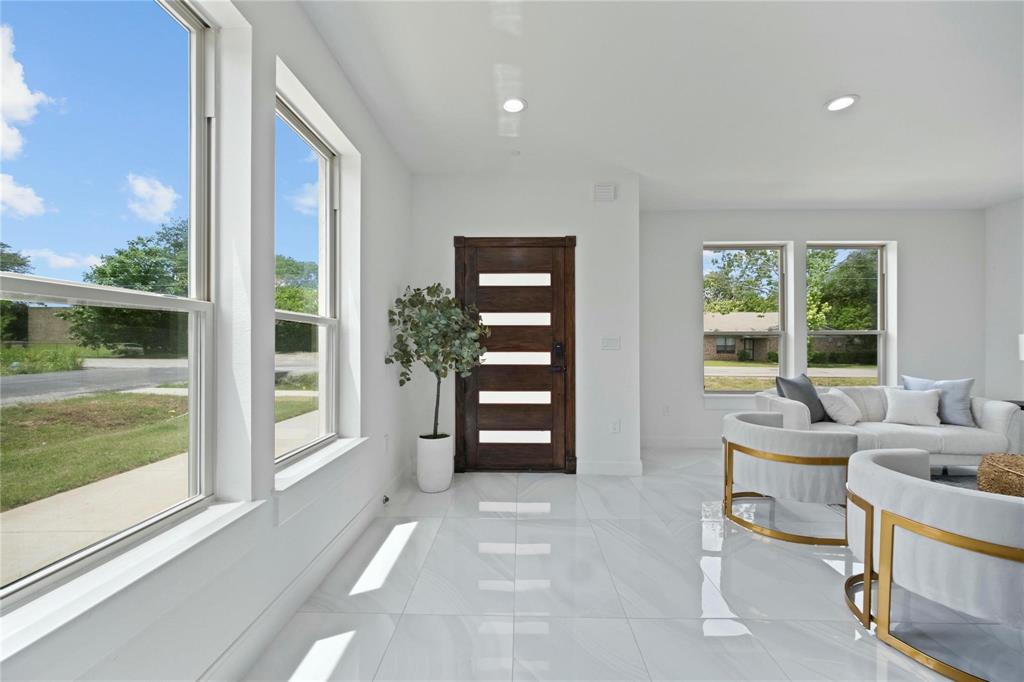 6230 Dewitt Street Sachse, TX 75048 - Photo 2 of 21 Foyer entrance featuring light tile patterned floors and recessed lighting