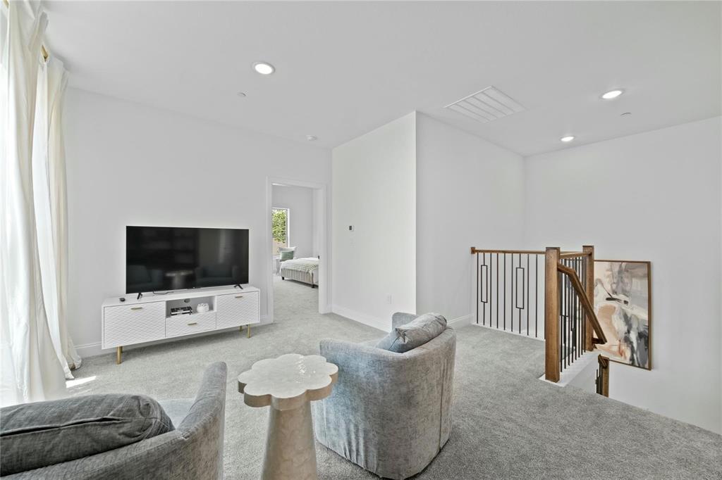 6230 Dewitt Street Sachse, TX 75048 - Photo 10 of 21 Carpeted living room featuring recessed lighting