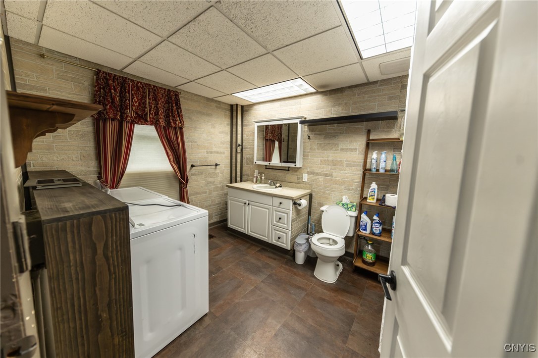 10660 County Route 77, Unit 662 Adams, NY 13605 - Photo 17 of 19 downstairs full bathroom/laundry