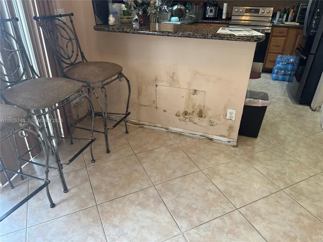 a view of a room with washer and dryer