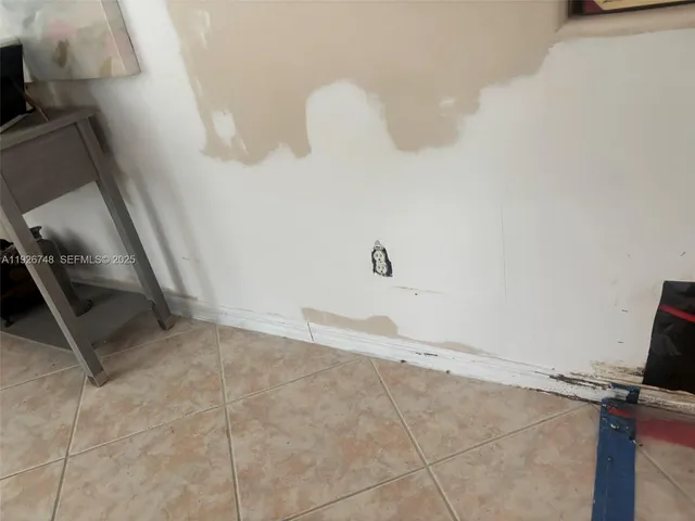 a view of a room with rack on the wall