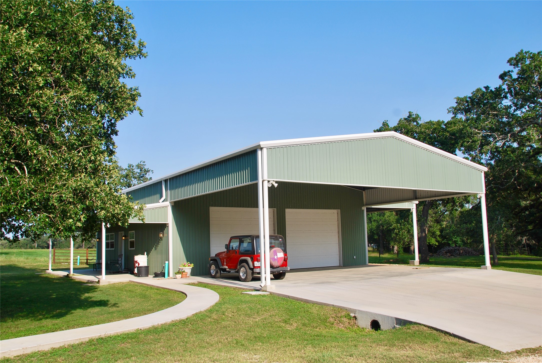 3545 East I- 10 Frontage Road Schulenburg, TX 78956 - Photo 11 of 40 a view of a house with backyard porch and sitting area