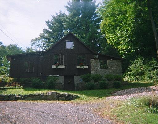 9 Windaway Road Bethel, CT 06801 - Photo 1 of 1 a front view of a house with a yard