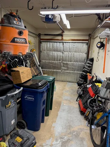 a front view of a house with a yard table and chairs