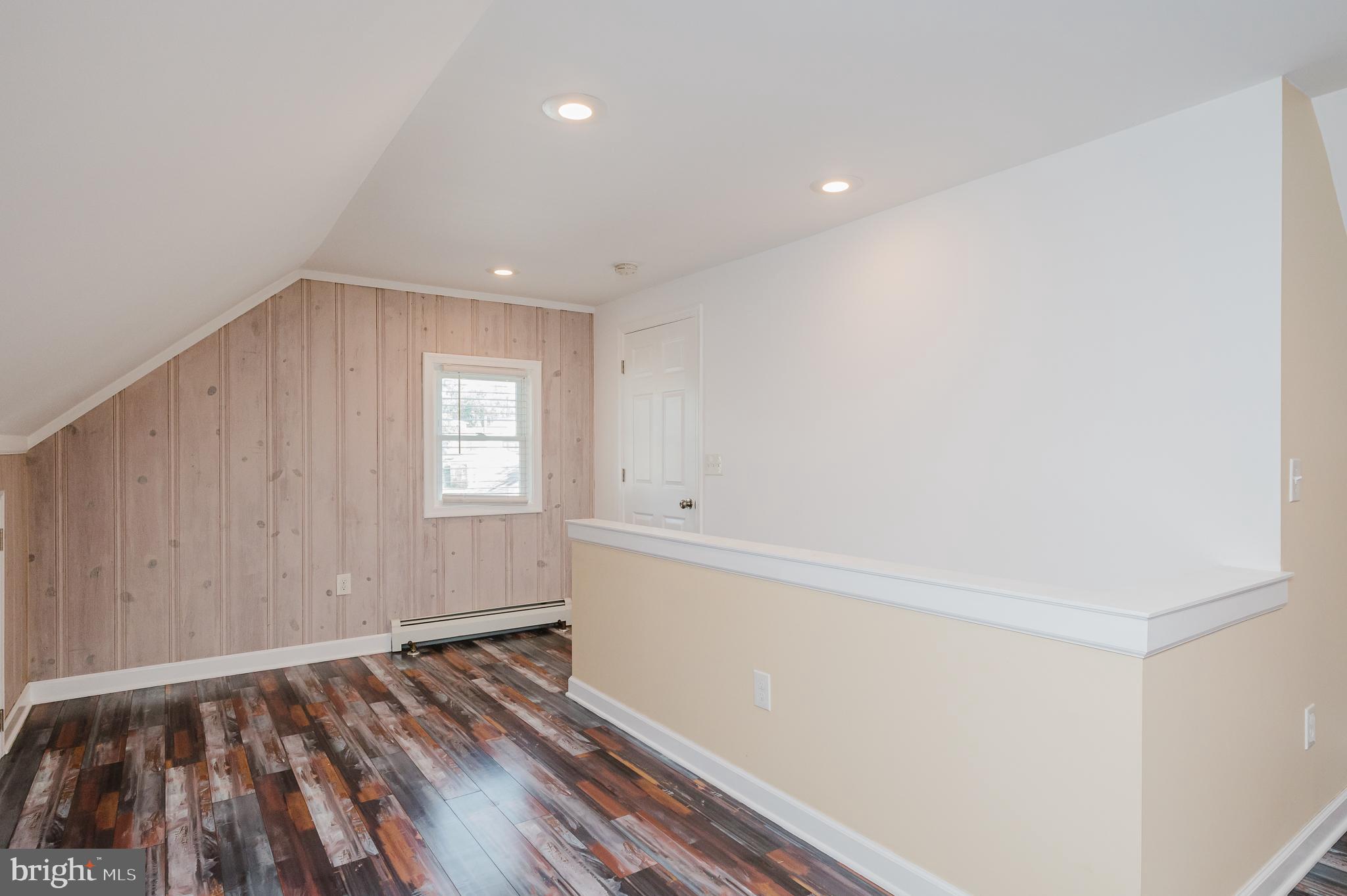 5501 Catalpha Road Baltimore, MD 21214 - Photo 28 of 40 a view of an empty room and window