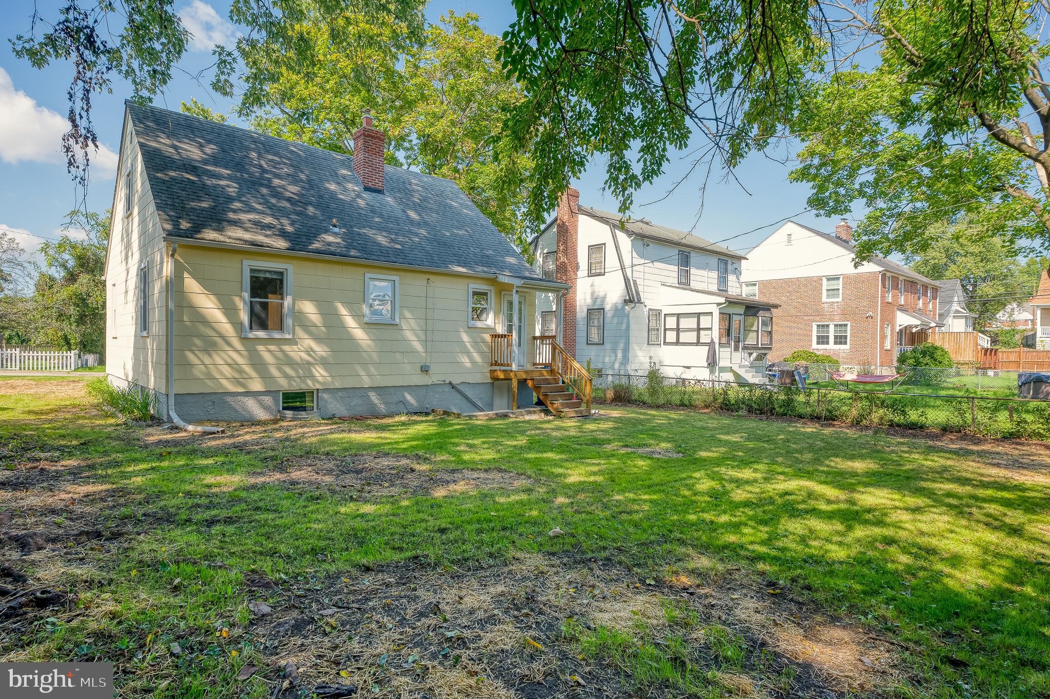 5501 Catalpha Road Baltimore, MD 21214 - Photo 39 of 40 a front view of house with yard