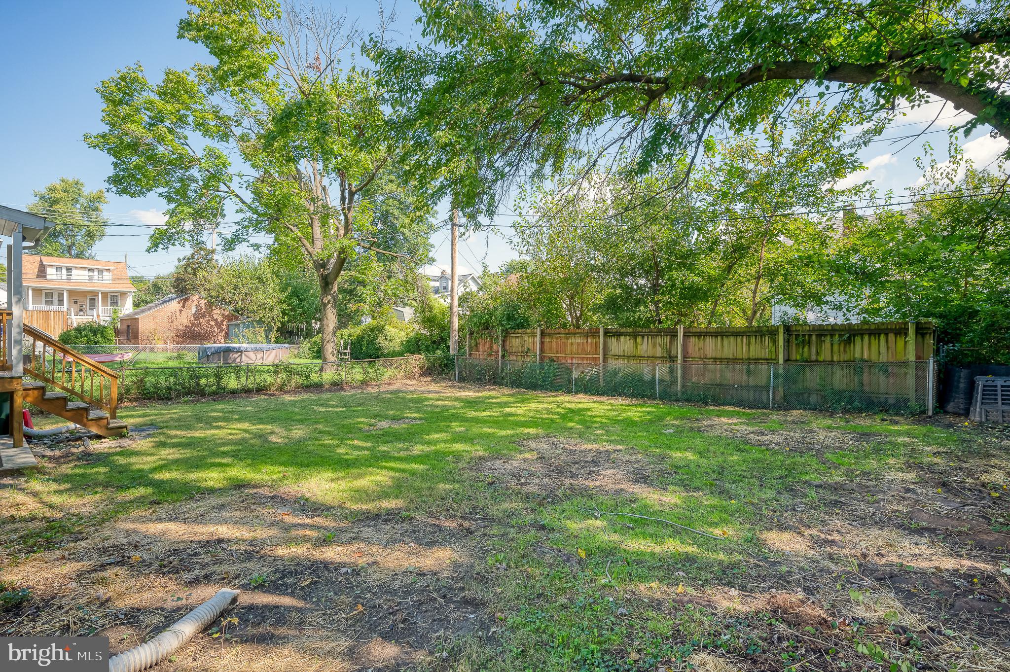 5501 Catalpha Road Baltimore, MD 21214 - Photo 40 of 40 a view of a yard with a tree