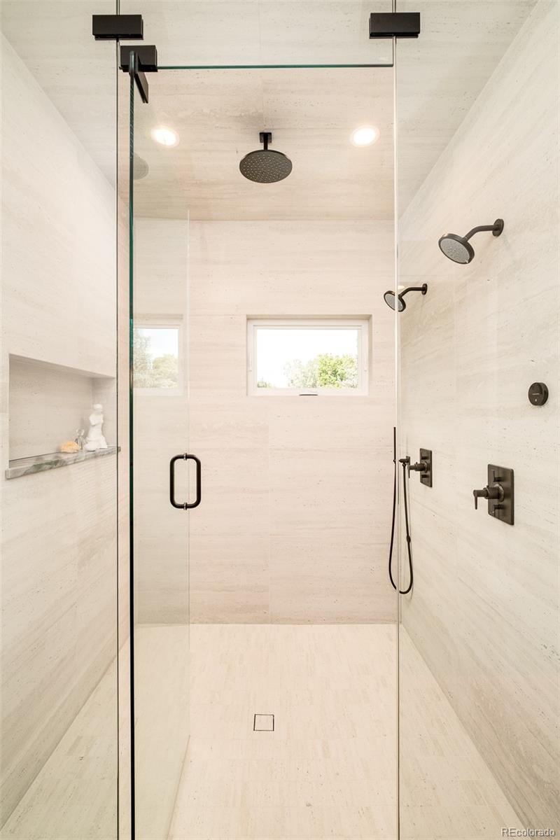 1253 South High Street Denver, CO 80210 - Photo 29 of 46 a bathroom with a shower