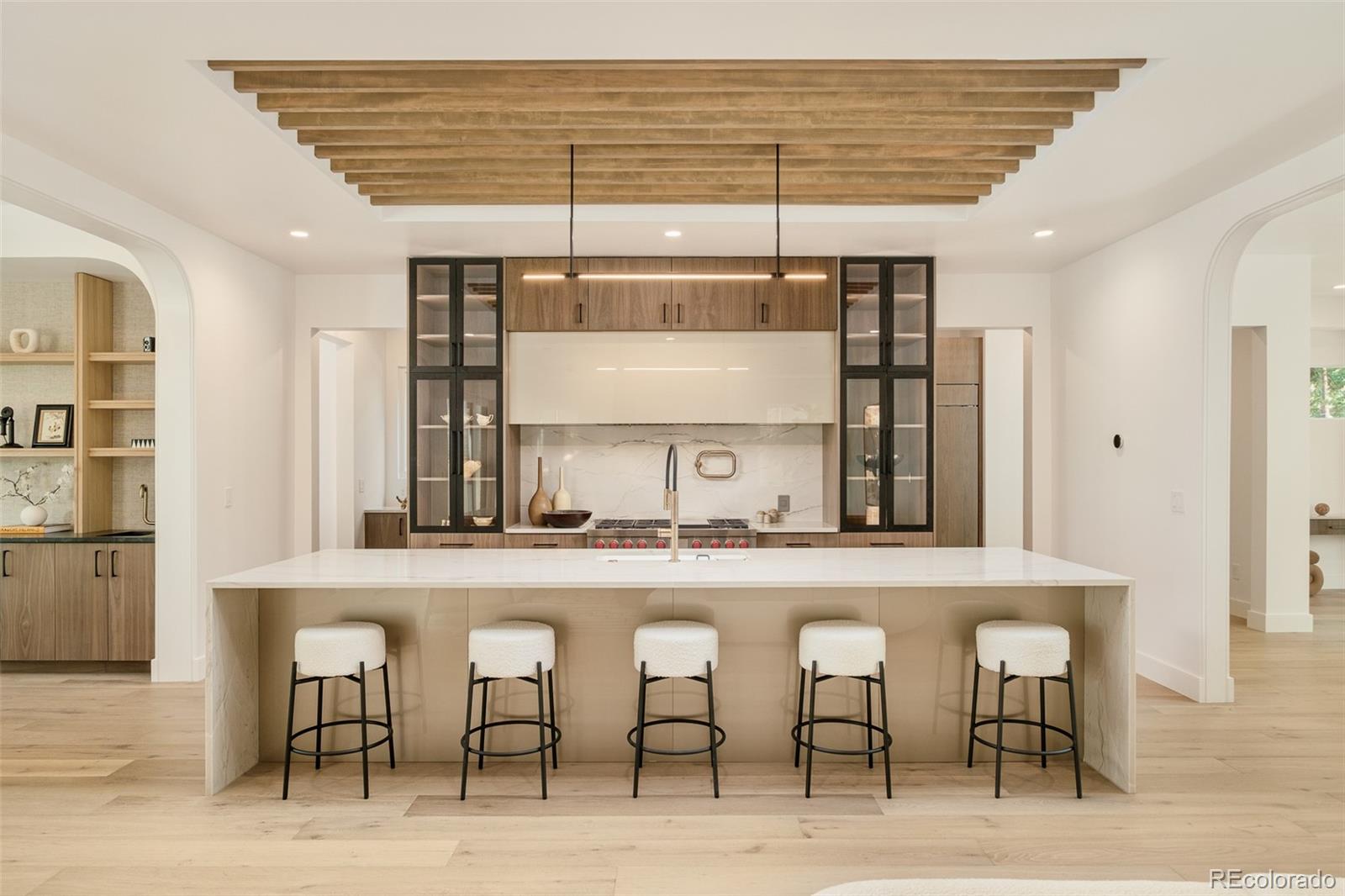 1253 South High Street Denver, CO 80210 - Photo 10 of 46 a kitchen with a table and chairs in it