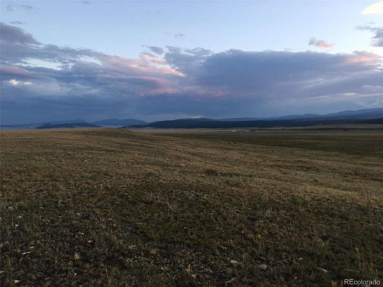 0 Thousand Peaks Ranch Hartsel, CO 80449 - Photo 17 of 40 a view of an ocean and sunset