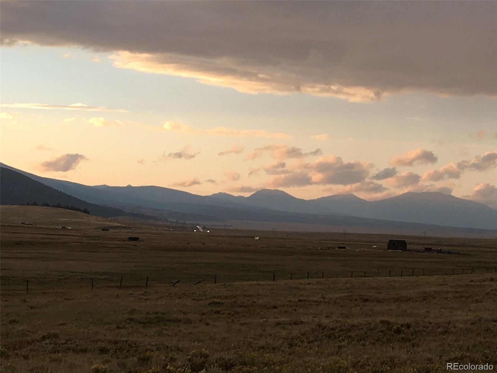 0 Thousand Peaks Ranch Hartsel, CO 80449 - Photo 8 of 40 a view of an ocean with mountains in the background