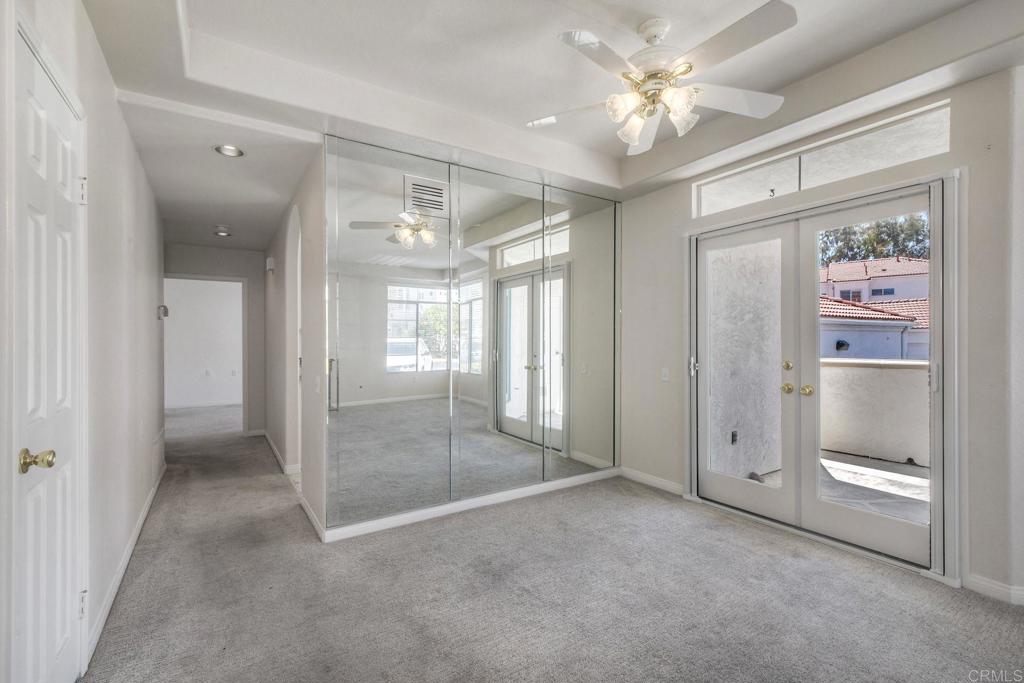3375 Genoa Way, Unit 144 Oceanside, CA 92056 - Photo 9 of 34 Dining Area with double French doors to access a patio.