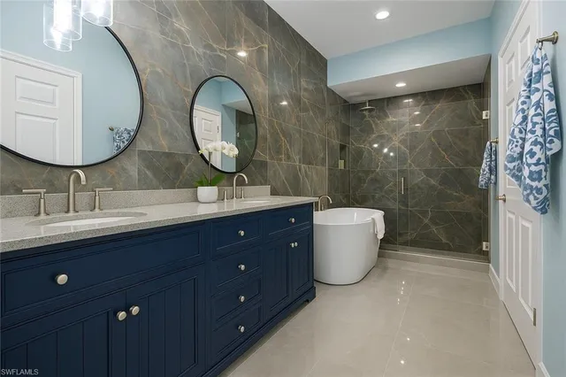 a room with water heater and wooden floor