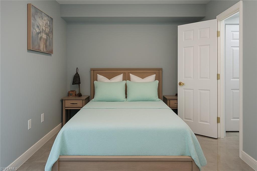 1320 Henley Street, Unit 2003 Naples, FL 34105 - Photo 20 of 36 a bedroom with a bed and a window