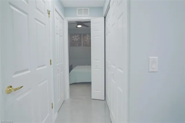 a room with water heater and view kitchen