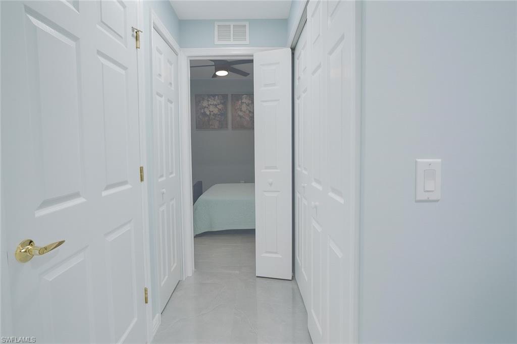 1320 Henley Street, Unit 2003 Naples, FL 34105 - Photo 27 of 36 a bathroom with a granite countertop shower