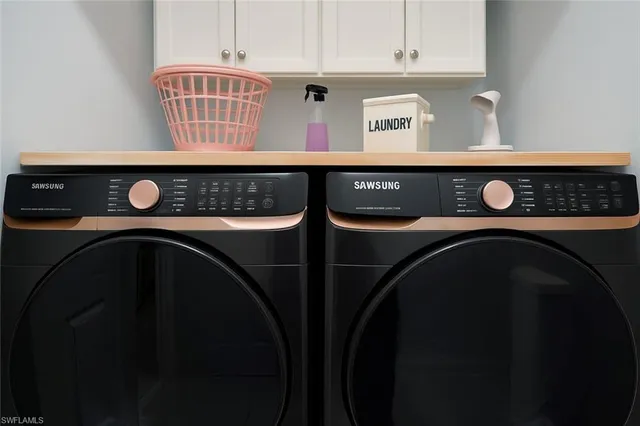 a outdoor living room with furniture and a flat screen tv