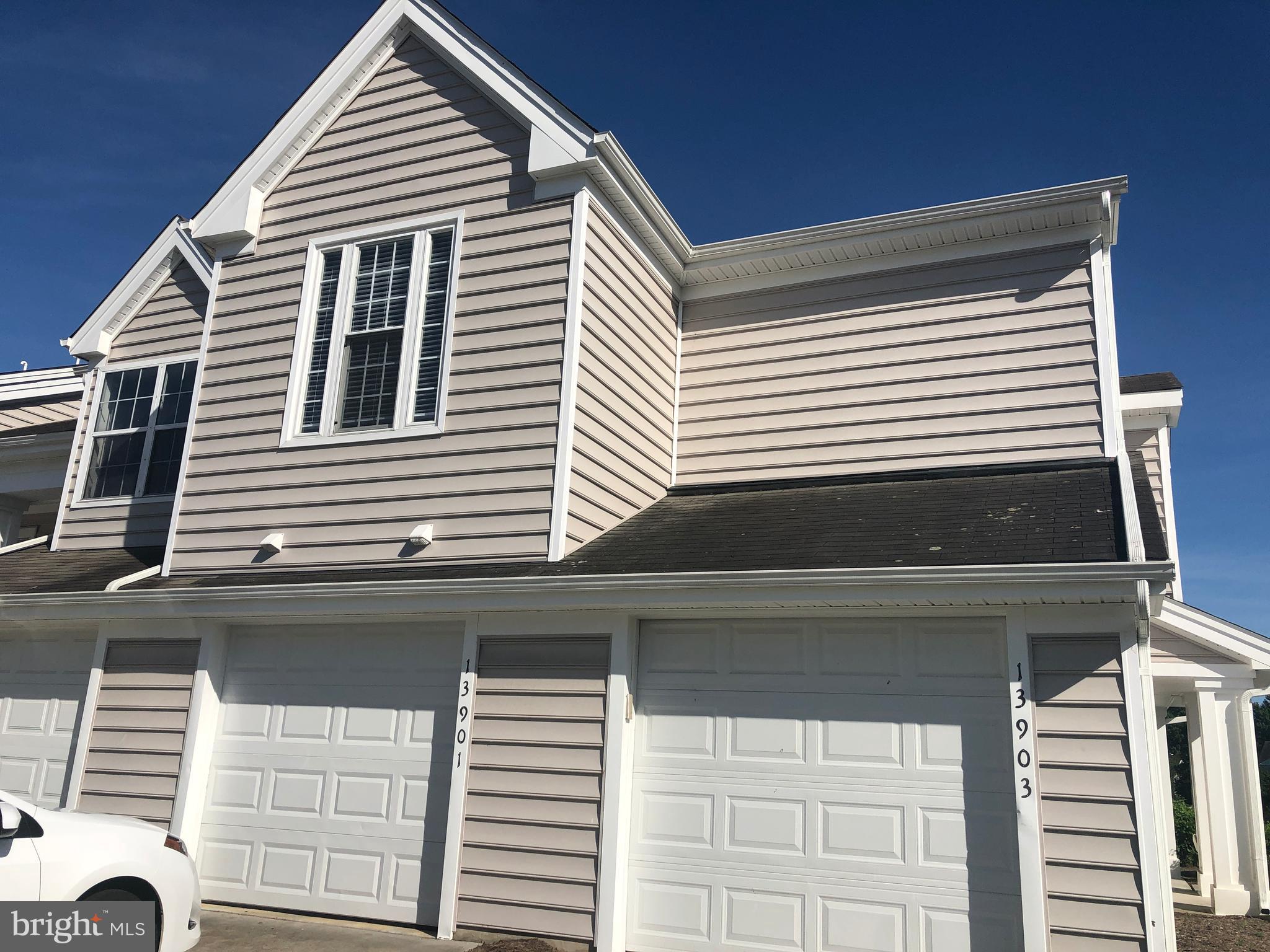 13901 King Gregory Way, Unit 391 Upper Marlboro, MD 20772 - Photo 1 of 14 a view of a house with a window