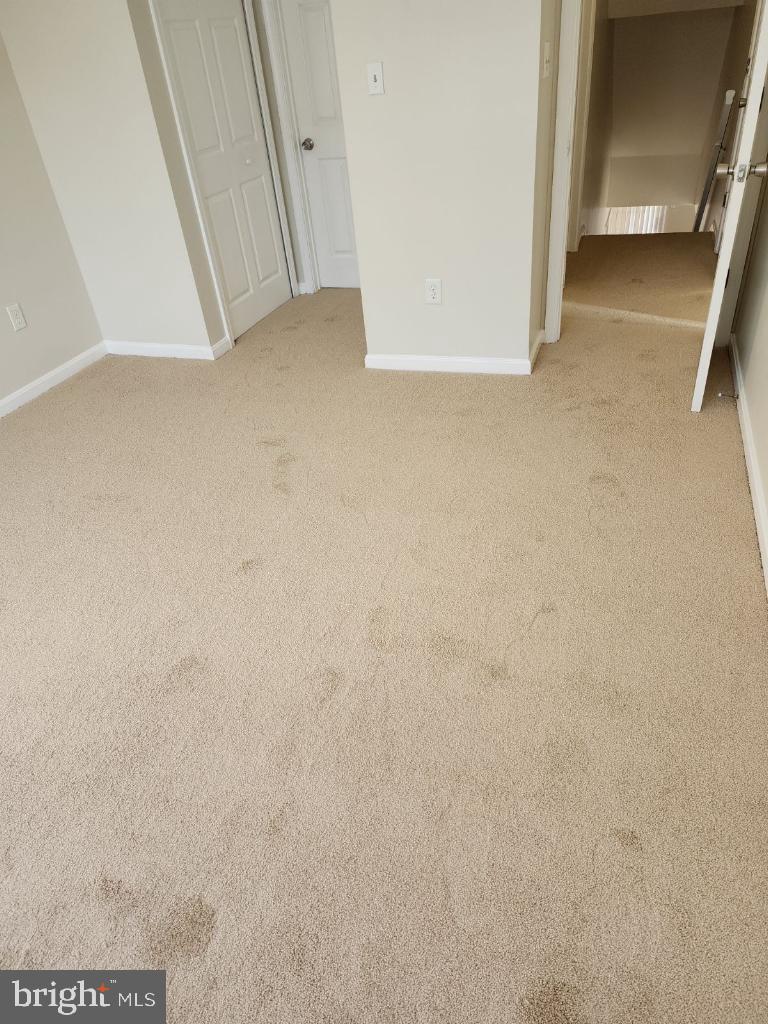 13901 King Gregory Way, Unit 391 Upper Marlboro, MD 20772 - Photo 12 of 14 a view of a hallway