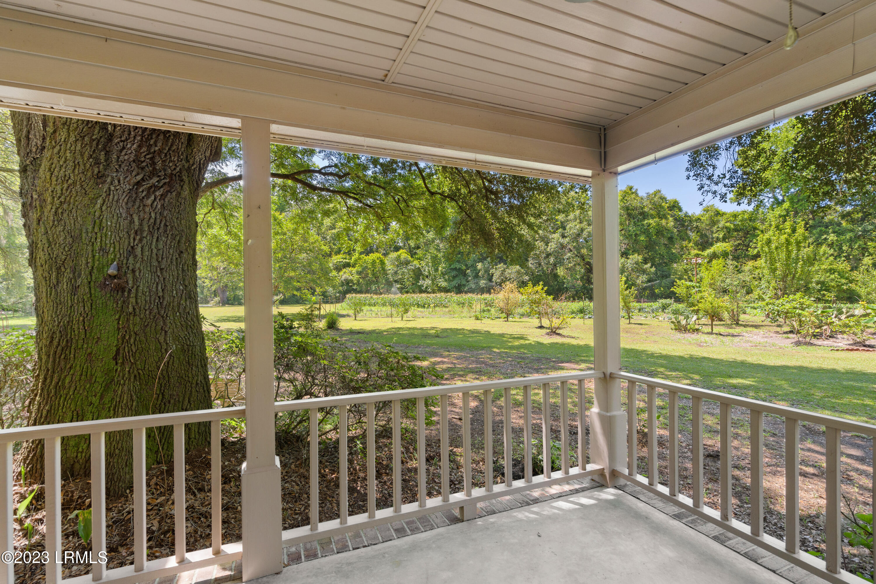 176 State Rd S-7-594 Beaufort, SC 29906 - Photo 5 of 42 Porch overlooking the garden
