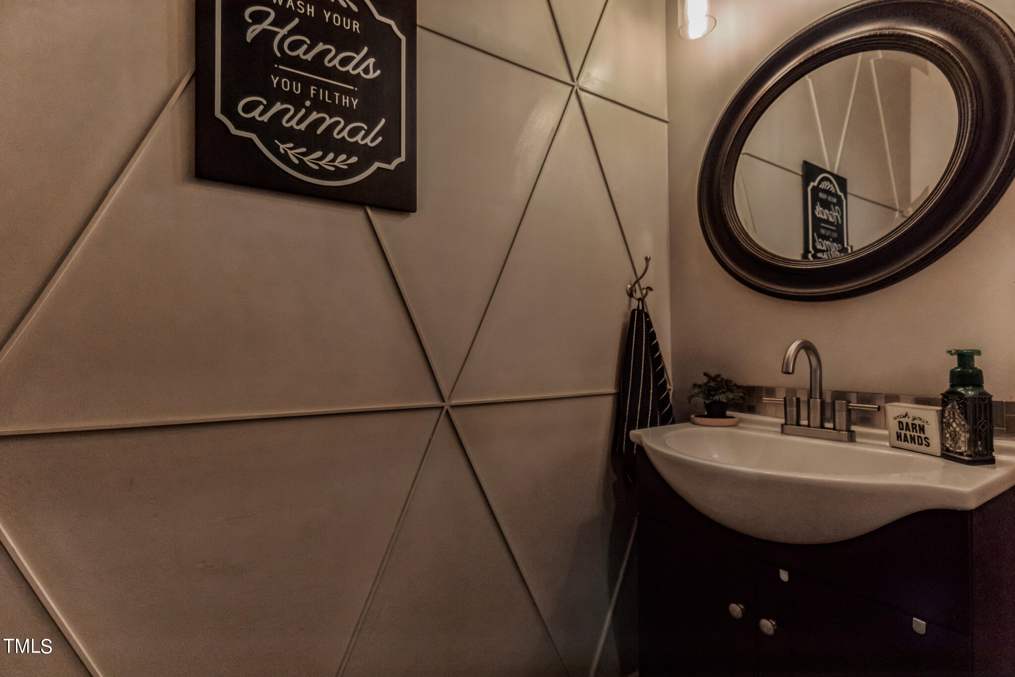 111 Oldstead Drive Raeford, NC 28376 - Photo 11 of 28 a bathroom with a sink and a mirror