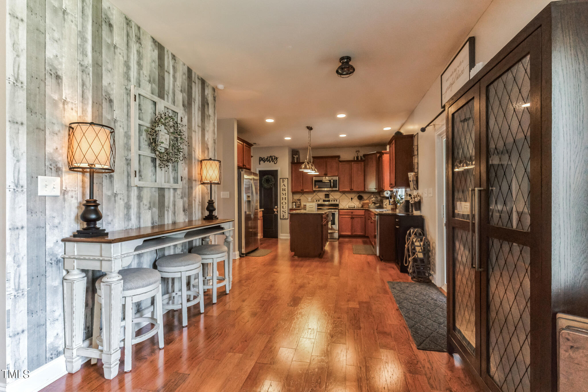 111 Oldstead Drive Raeford, NC 28376 - Photo 12 of 28 a view of a kitchen with furniture and wooden floor