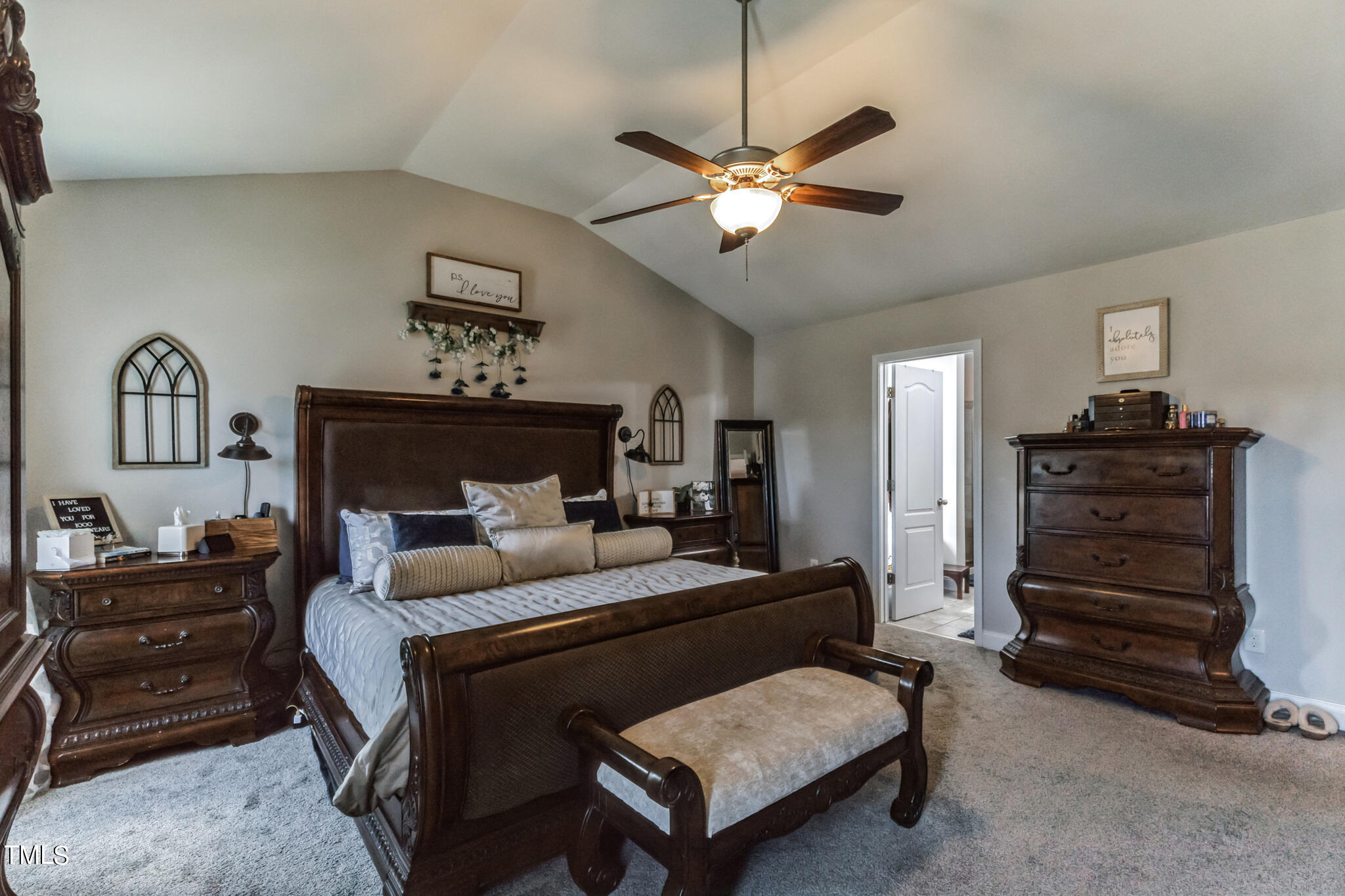 111 Oldstead Drive Raeford, NC 28376 - Photo 18 of 28 a living room with furniture and a chandelier