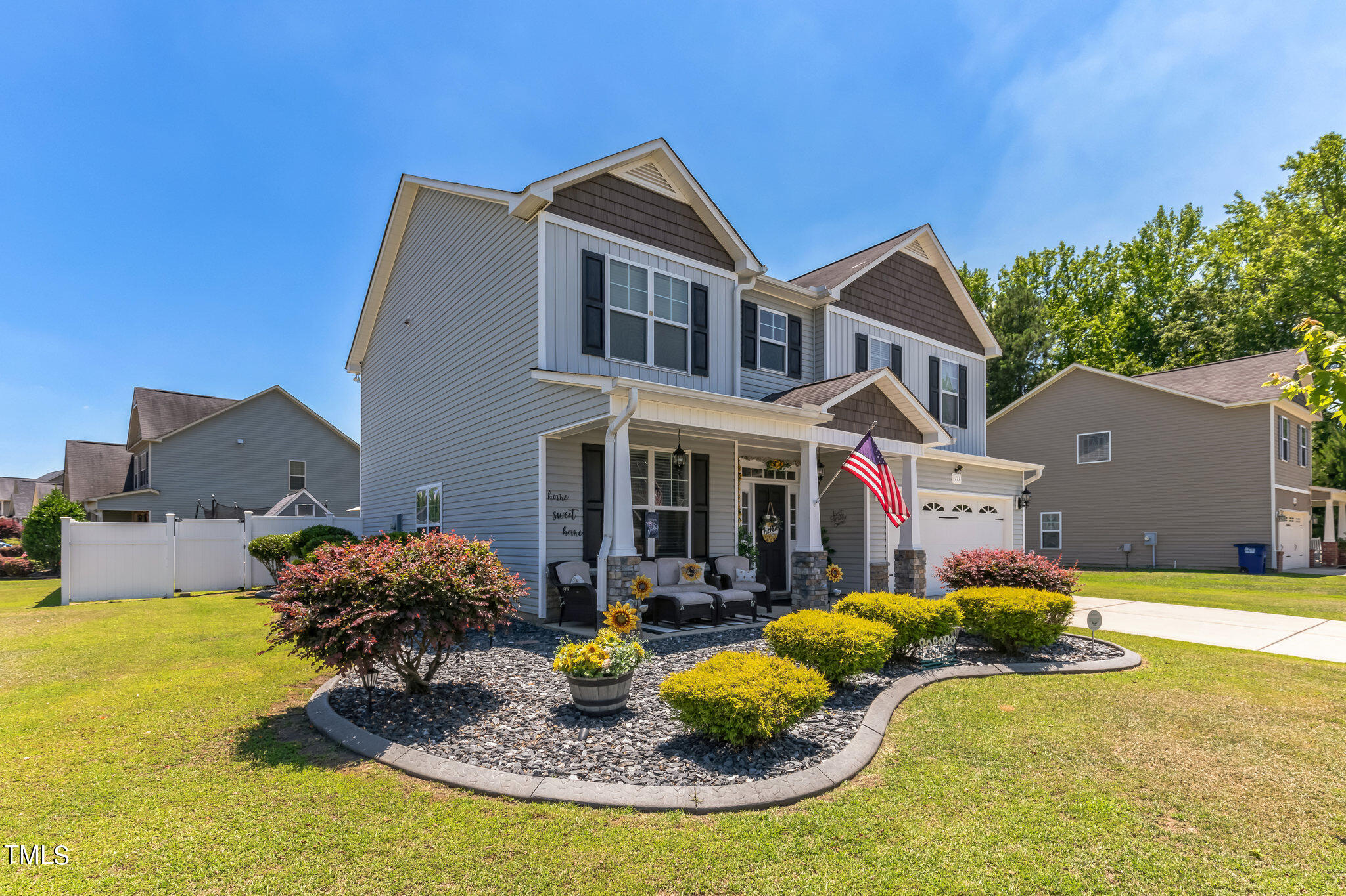 111 Oldstead Drive Raeford, NC 28376 - Photo 2 of 28 a front view of a house with garden