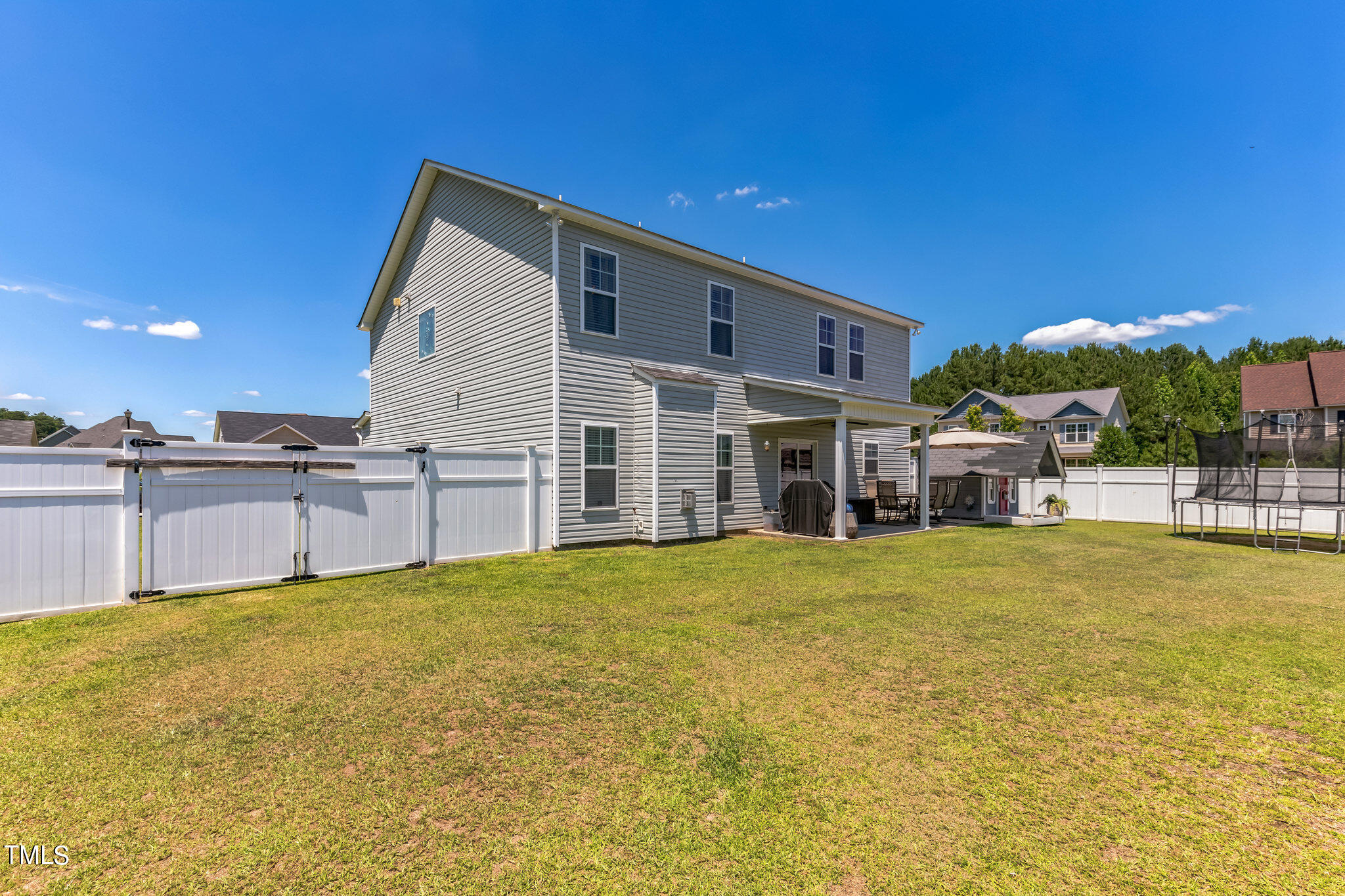 111 Oldstead Drive Raeford, NC 28376 - Photo 5 of 28 a view of a house with a backyard