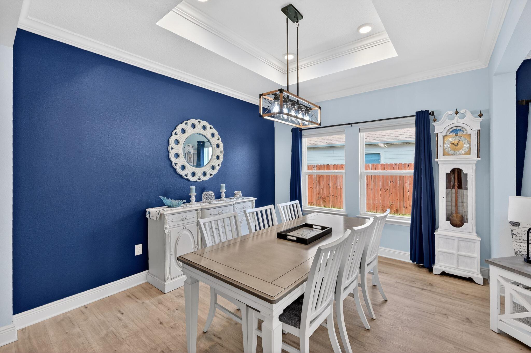 27 Oak Trees Lane East Freeport, FL 32439 - Photo 12 of 33 a view of a dining room with furniture window and wooden floor
