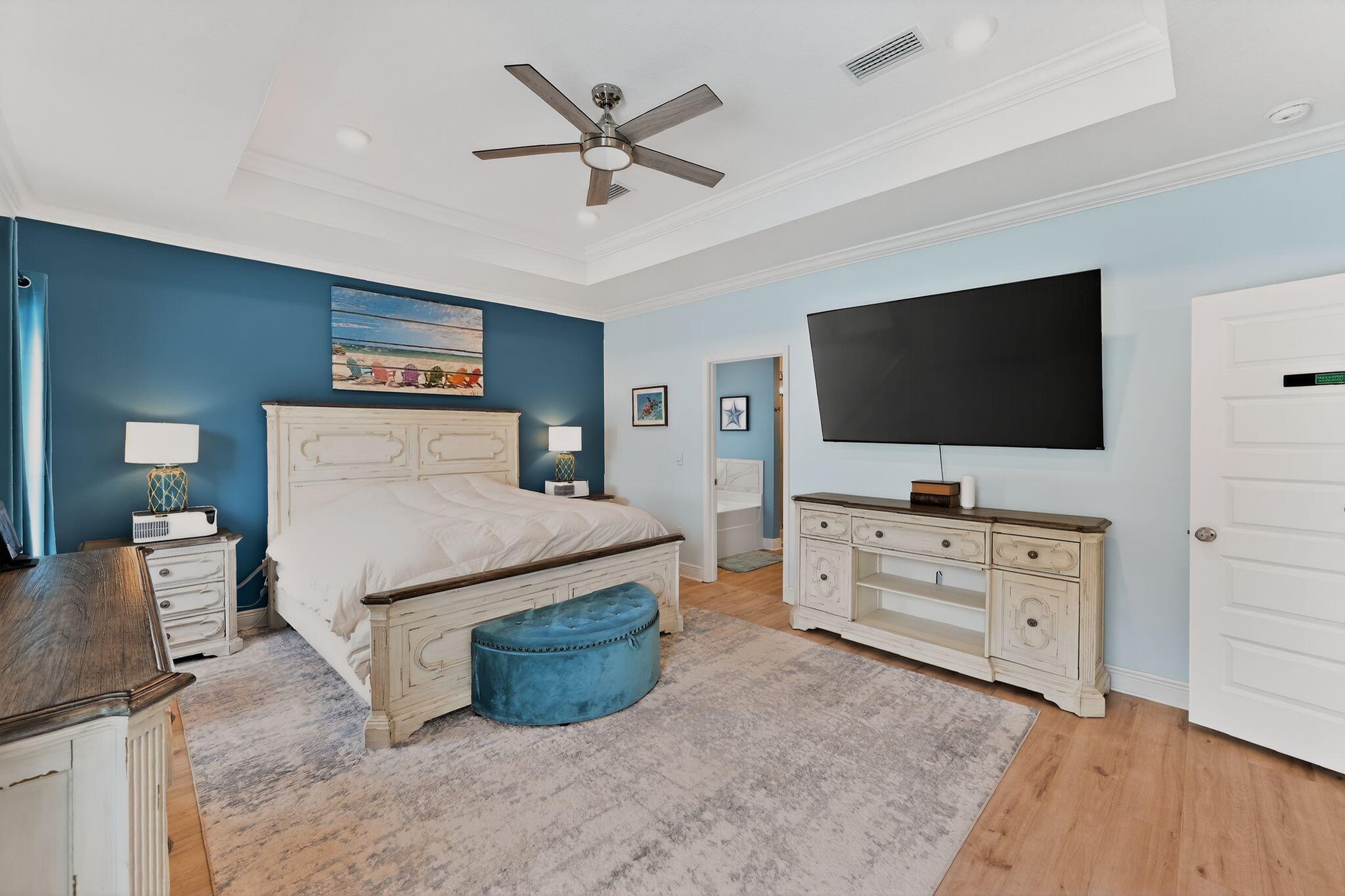 27 Oak Trees Lane East Freeport, FL 32439 - Photo 17 of 33 a room with furniture and flat screen tv