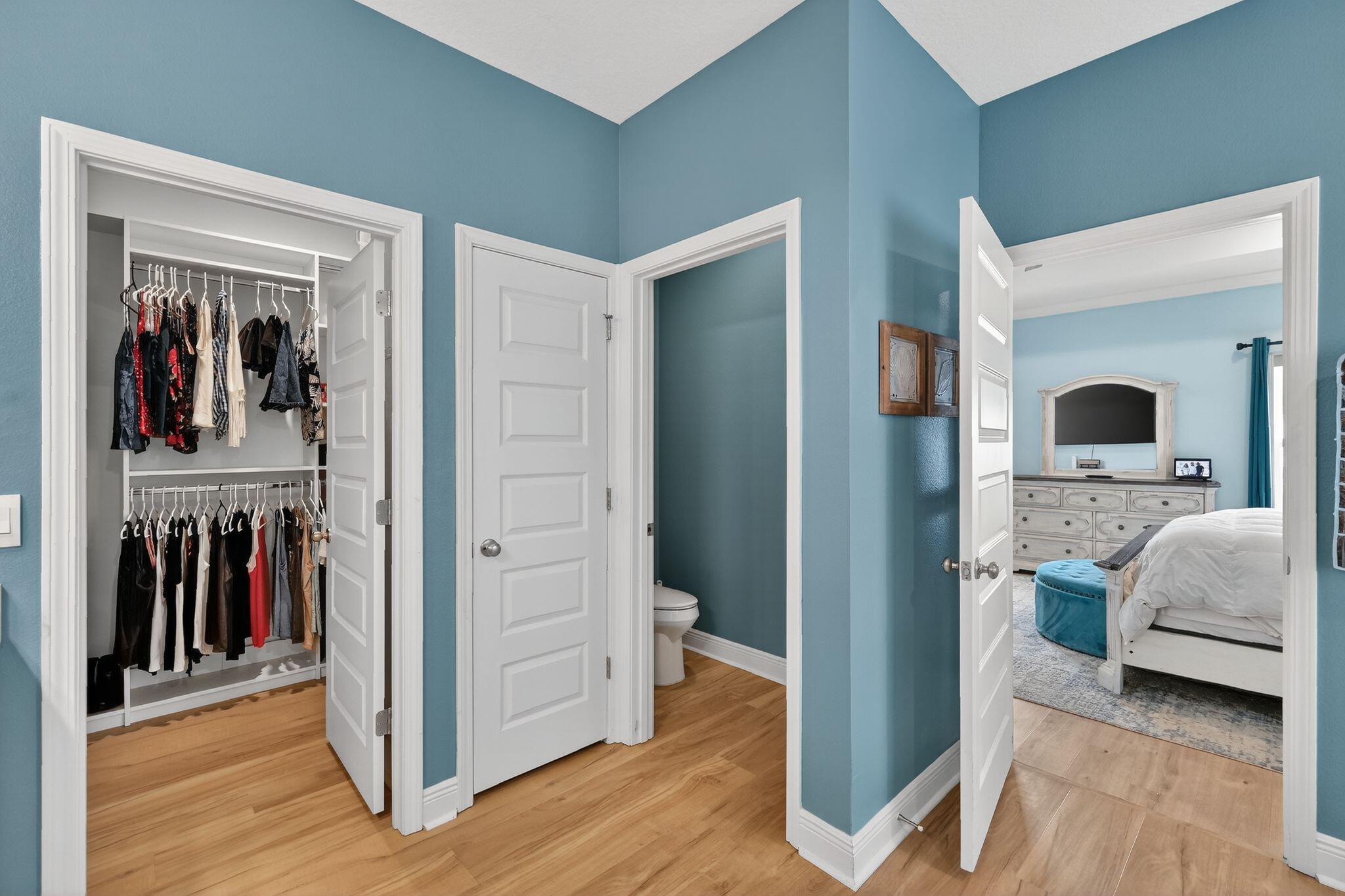 27 Oak Trees Lane East Freeport, FL 32439 - Photo 18 of 33 a living room with furniture and a walk in closet