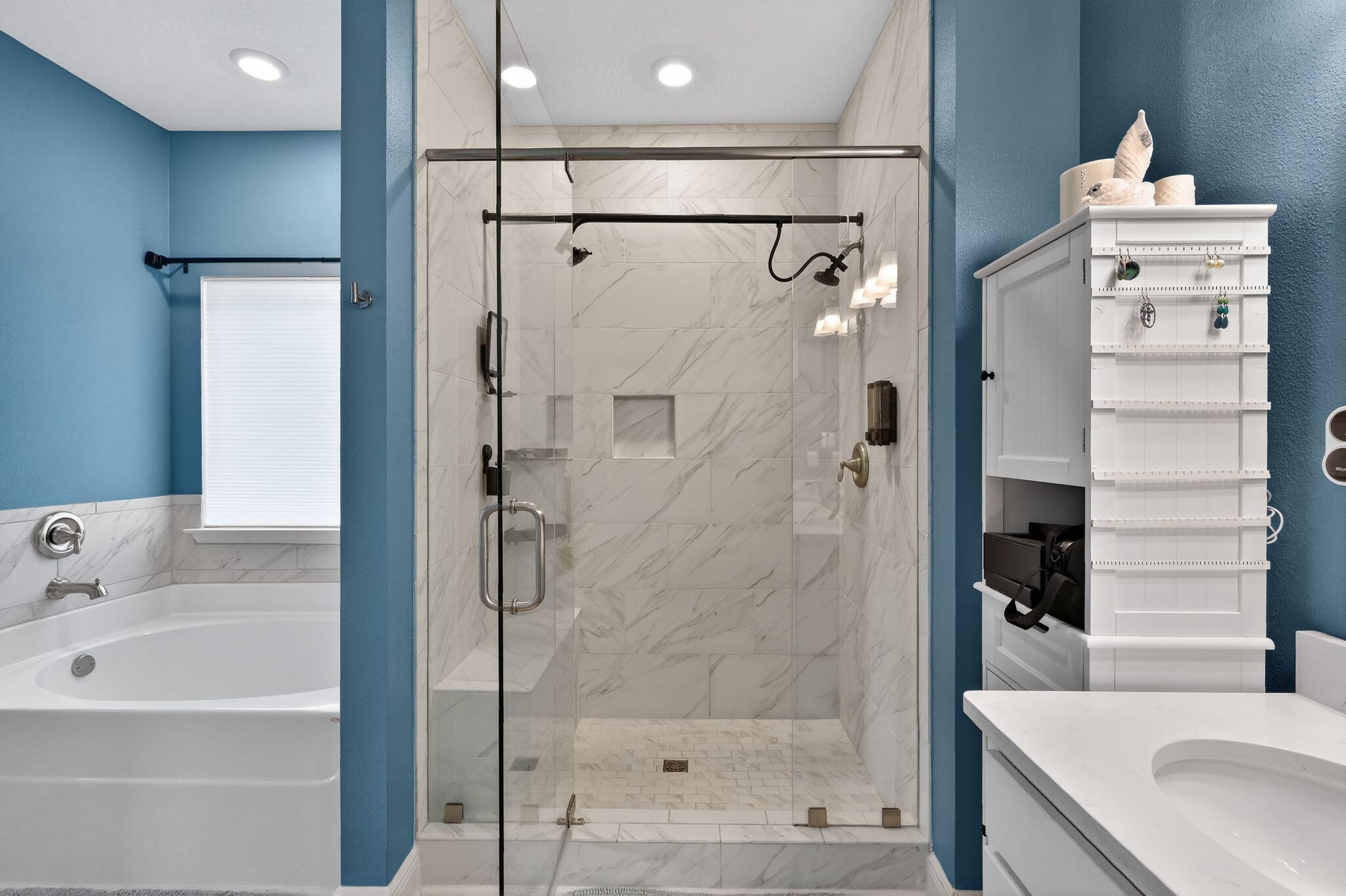 27 Oak Trees Lane East Freeport, FL 32439 - Photo 19 of 33 a bathroom with a bathtub and a shower