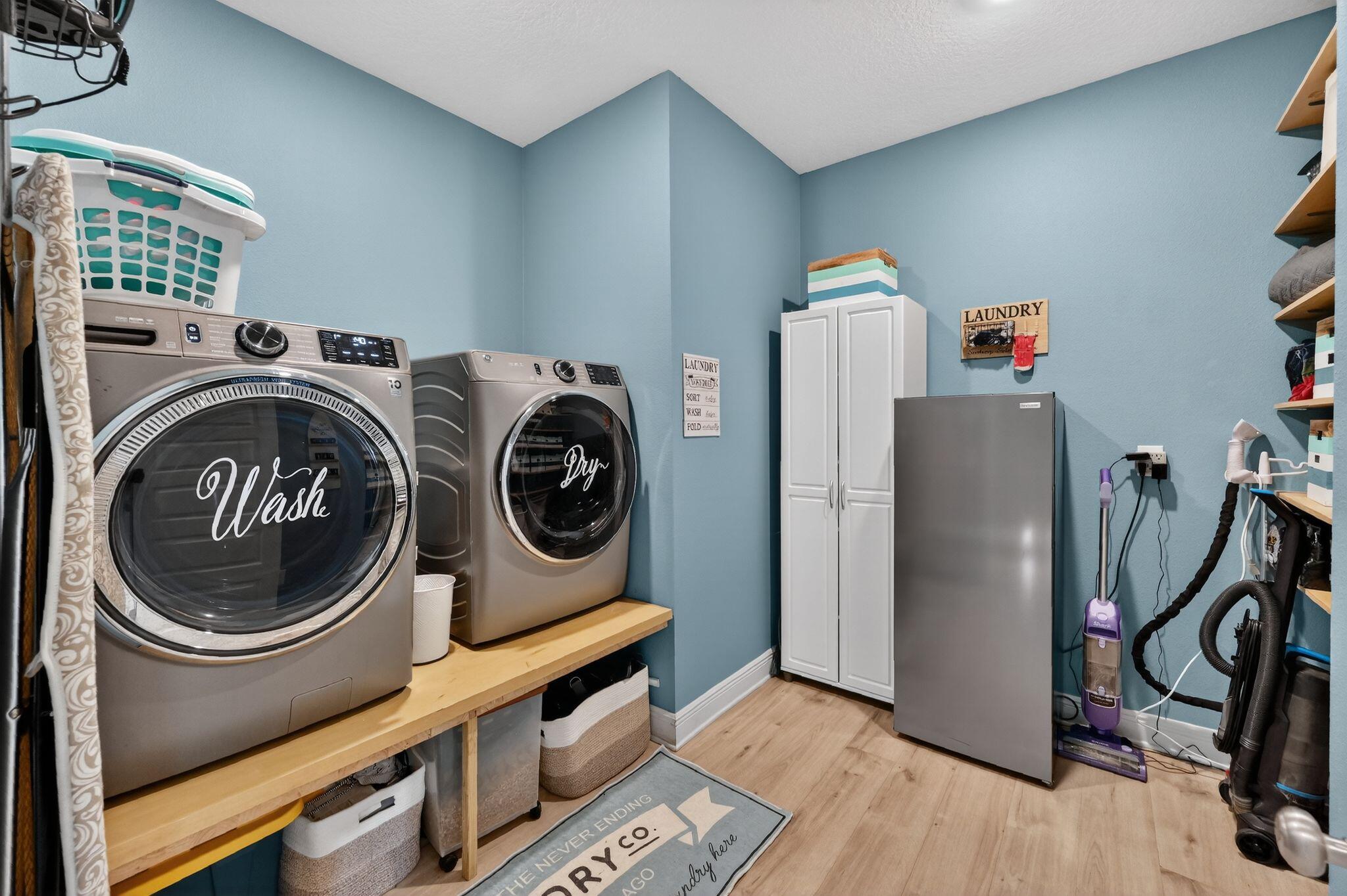27 Oak Trees Lane East Freeport, FL 32439 - Photo 25 of 33 a utility room with dryer and washer