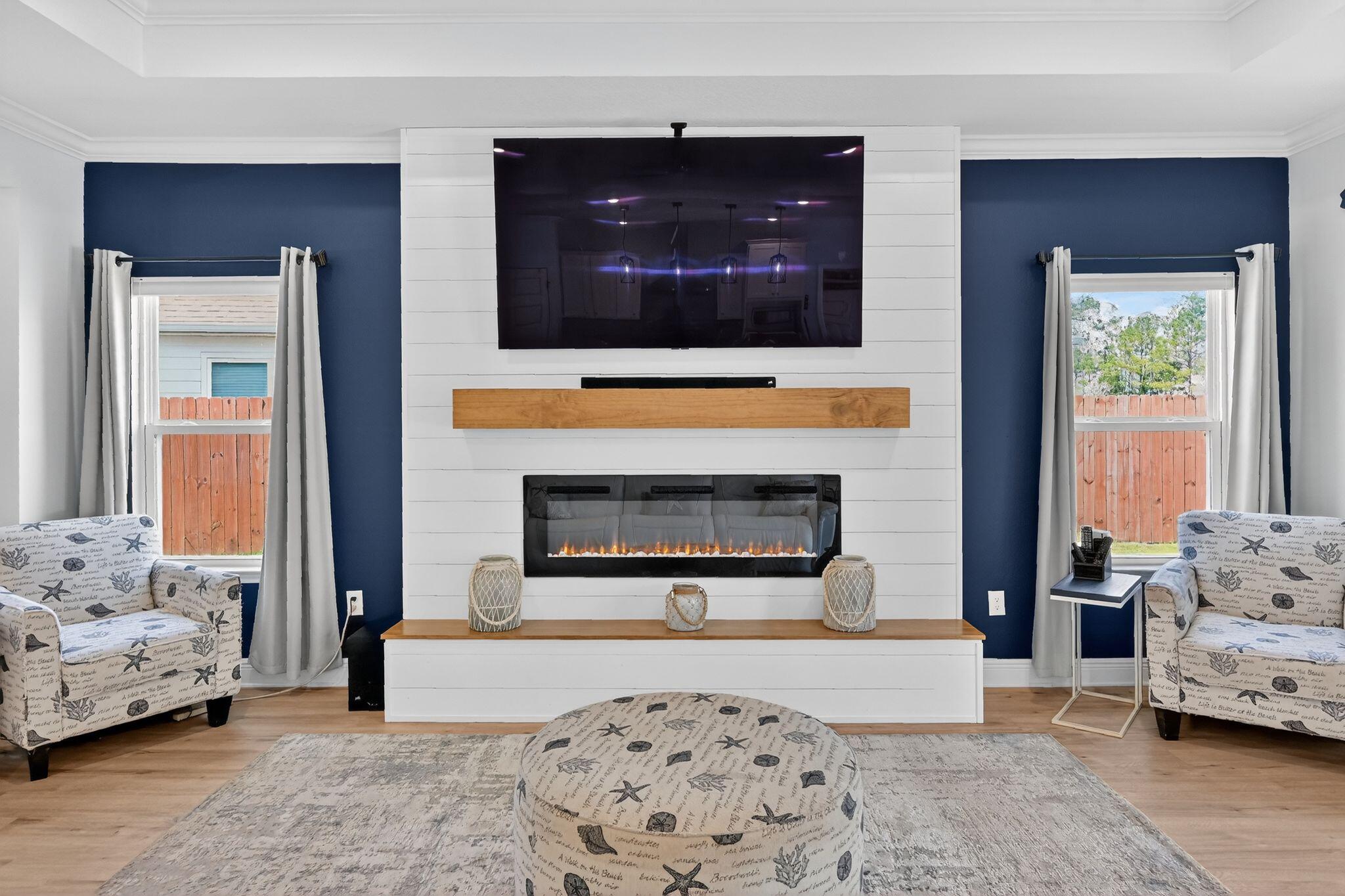 27 Oak Trees Lane East Freeport, FL 32439 - Photo 6 of 33 a living room with furniture and a fireplace