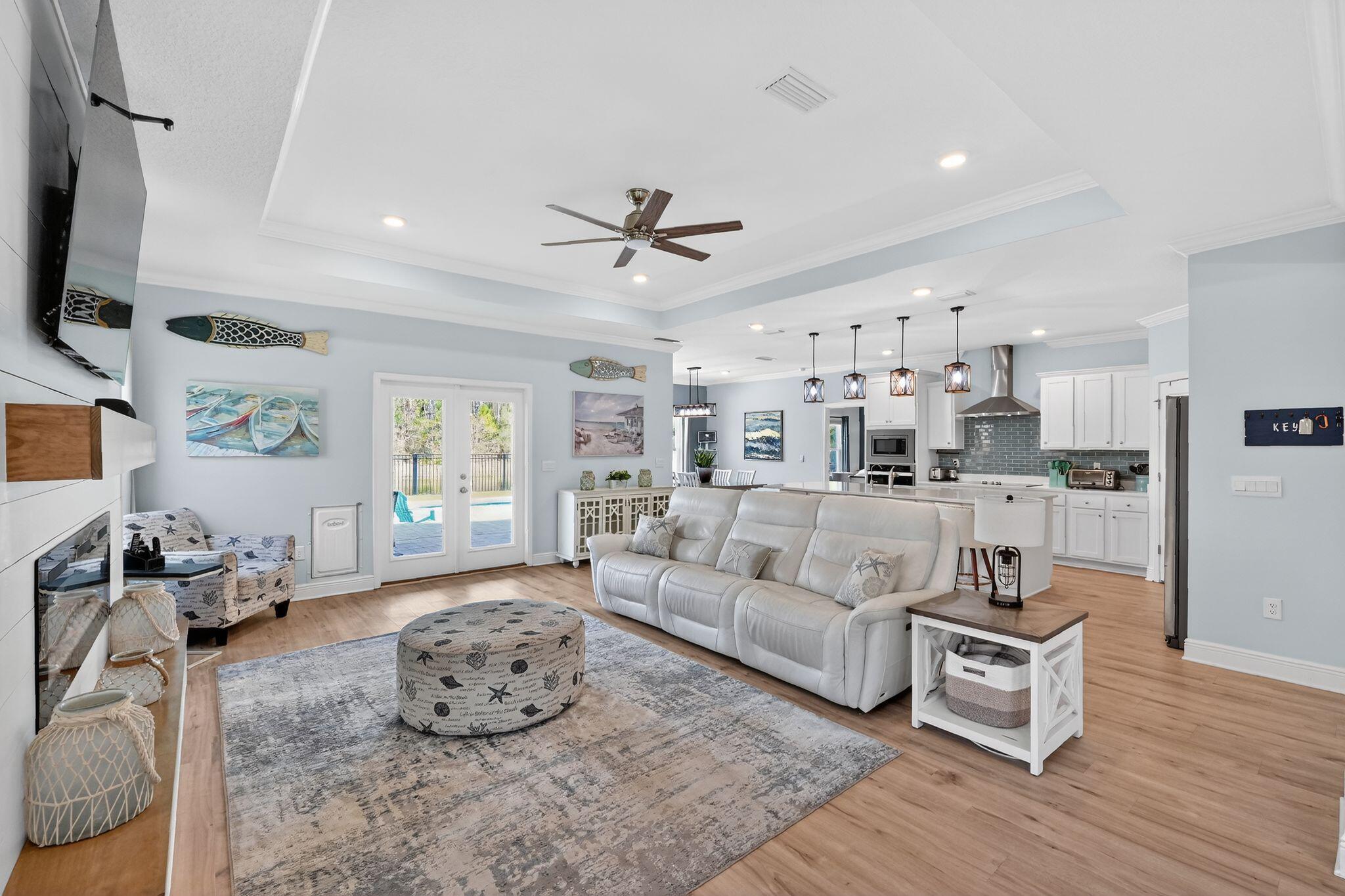 27 Oak Trees Lane East Freeport, FL 32439 - Photo 8 of 33 a living room with furniture and a large window