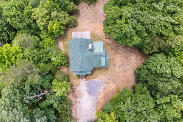 a front view of a house with yard