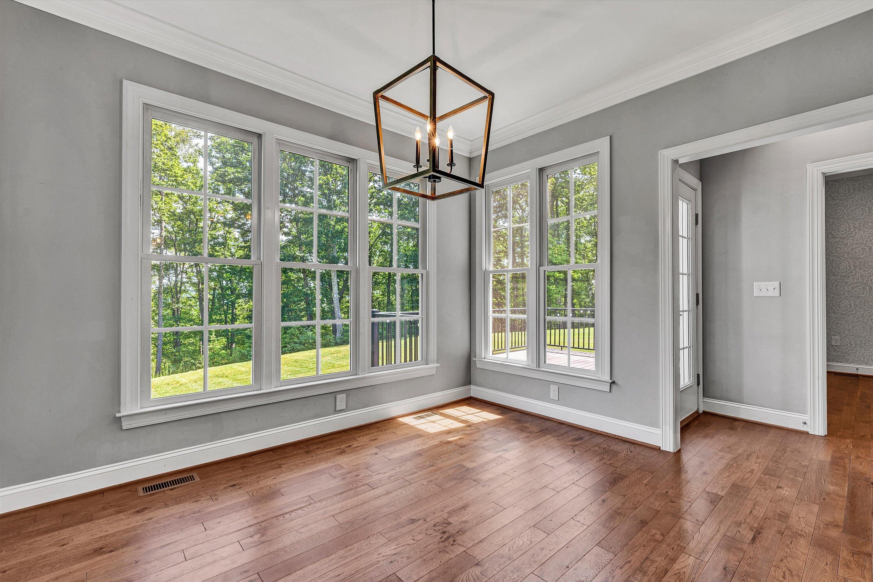 6981 Fairway Ridge Road Salem, VA 24153 - Photo 19 of 53 a view of room with window wooden floor and front door