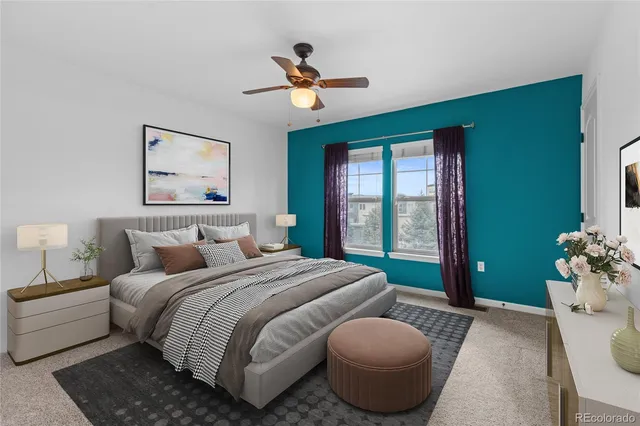 a bathroom with a double vanity sink toilet and a mirror