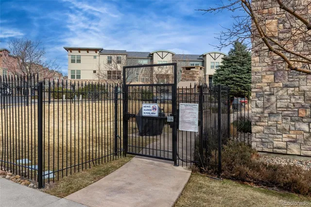 a view of a house with backyard porch and sitting area