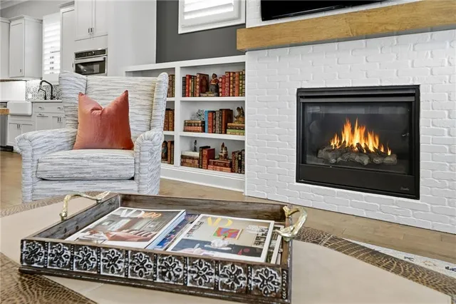 a bedroom with a bed and flat screen tv